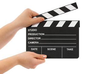 Hands with cinema clapboard