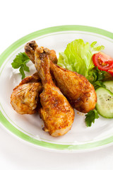 Roasted chicken drumsticks and vegetables