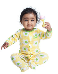 Smiling Baby Girl Playing with Rattle