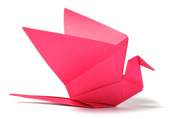 Origami bird over white
