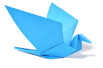 Origami bird over white