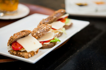 Cheese hamburgers in a plate at restaurant