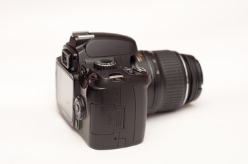 Digital Single Lens Reflex Camera on isolate background.