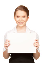 Fototapeta premium happy teenage girl with blank board
