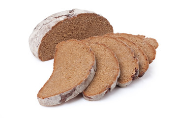 Sliced homemade brown bread, isolated on white