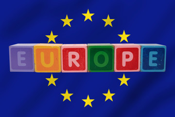 europe and flag in toy letters