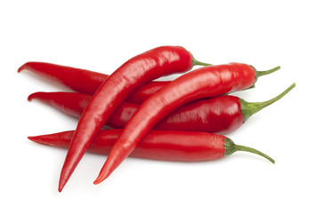 Red chilli peppers on a white background