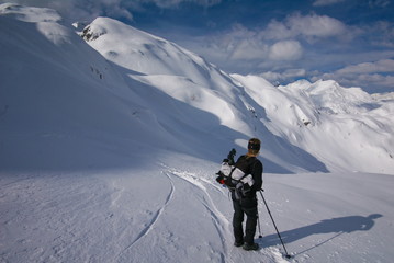 Fototapeta na wymiar woman hiking in winter, julijan alps