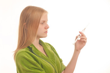 Obraz premium Young adorable woman doctor holding syringe with vaccine on whit