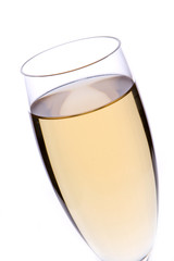 A glass of champagne, isolated on a white background.