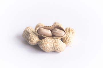 Stack of  peanuts on the white background