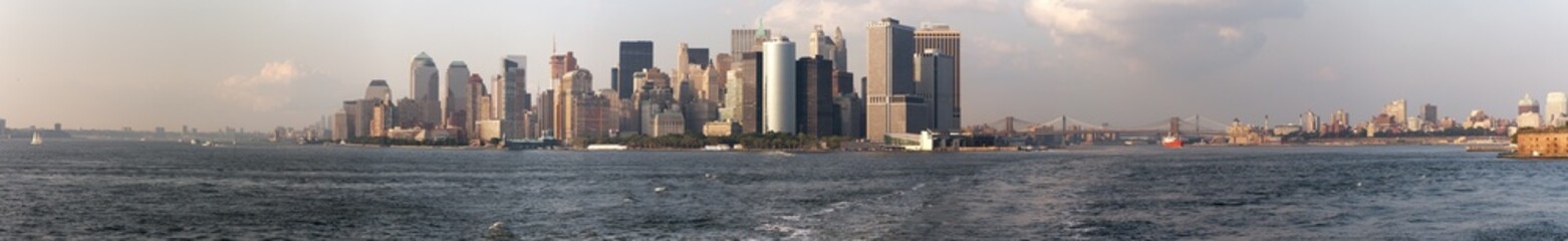 panorama of new york city from a ferry boat