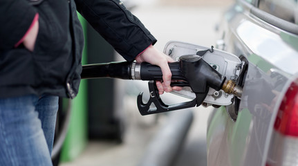 Car fueling at the gas station.