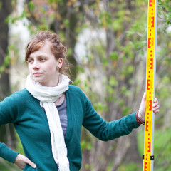 young land surveyor at work