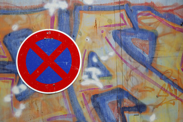 No Stopping sign and colorful wall