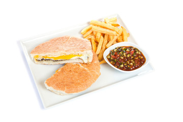 Cheese fillet with french fries and sauce