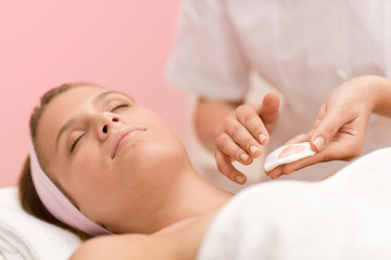 Fototapeta na wymiar Facial care - woman cosmetics treatment in salon