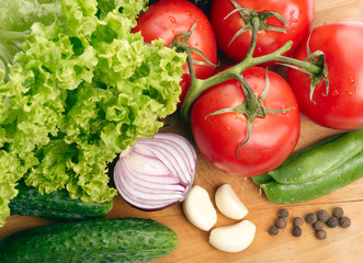 Fresh vegetables on wooden hardboard