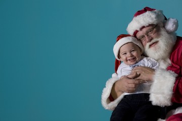 Obraz premium Portrait Of Santa With A Baby