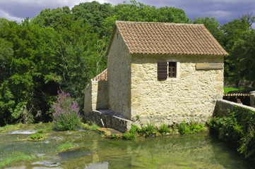 Fototapeta na wymiar The house is surrounded by water