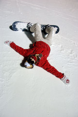 The cheerful girl with a snowboard