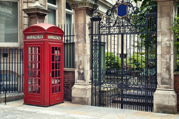 Fototapeta premium Traditional old style UK red phone box in London.