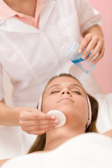 Obraz na płótnie Canvas Skin care - woman cleaning face