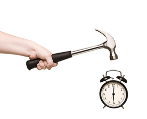 Alarm Clock and hammer in hand