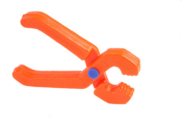 Children's toy pincers it is isolated on a white background
