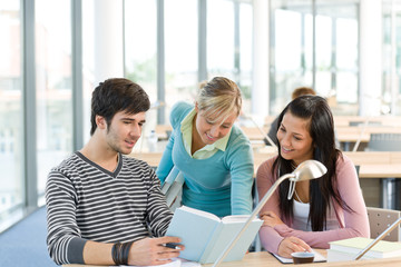 High school - three students with book