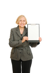 Portrait of a happy senior woman holding clipboard