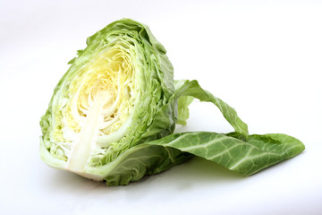 Young green cabbage on white background