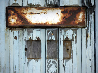 Letter flap on old wooden door