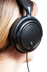 Young woman with headphones close-up