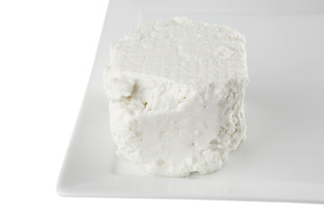 Obraz na płótnie Canvas light cheese on plate