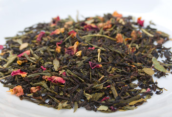 Fototapeta premium coupage Ceylon, green tea with cherry ,in studio