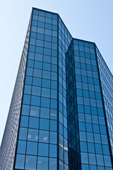 Fototapeta na wymiar Blue Glass Office Tower with Lights