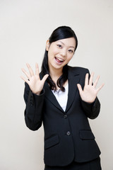 portrait of japanese business woman cheering