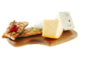 cheeses and salmon on wood