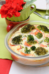 Pie with broccoli and red fish
