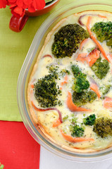 Pie with broccoli and red fish