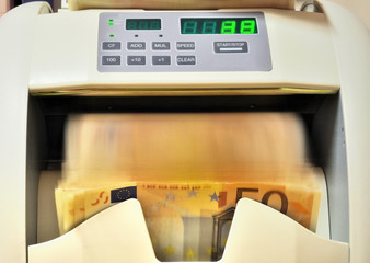 Electronic money counter, close up