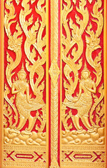 red and yellow thai painting in buddha temple building