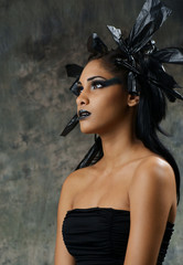 edgy gothic Halloween makeup of young woman
