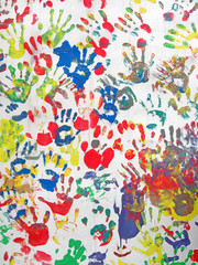 color hands on wall, handprint heap diversity background