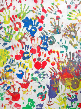 color hands on wall, handprint heap diversity background