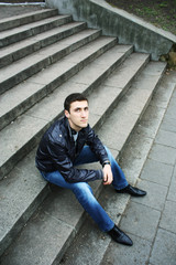 a young man on the stairs