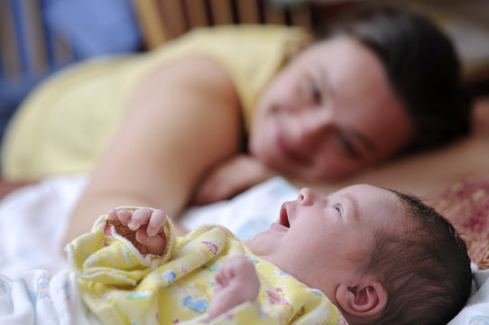 Picture of happy mother with newborn baby
