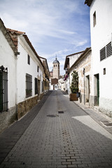 Fototapeta na wymiar Town of white houses, typical Spanish architecture