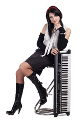 Beautiful girl sitting with synthesizer isolated